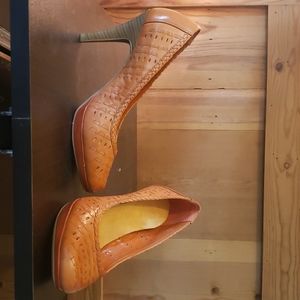 Leather 4" heels. Rust colored